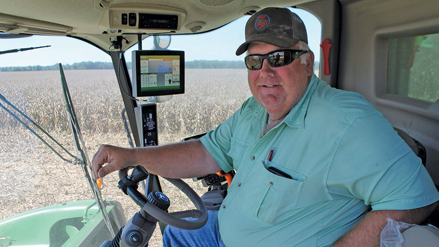 Mark Steiman harvests corn